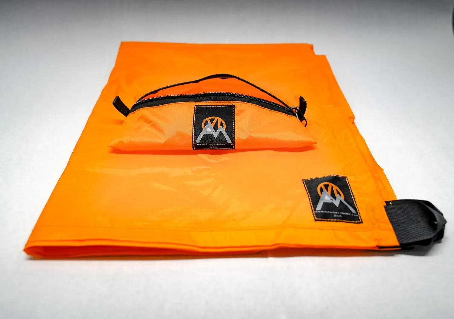 | Multicloth 2.0 Water Resistant Ultralight Lightweight Backpacking Camping Survival and Ground Tarp | 1.9oz Orange | Measures 56 inches by 72 inches | has Stake Loops