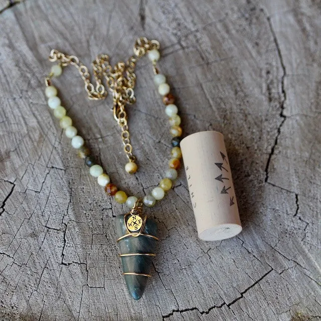 Durango Trails stone pendant with bronze compass charm and rainbow moonstone
