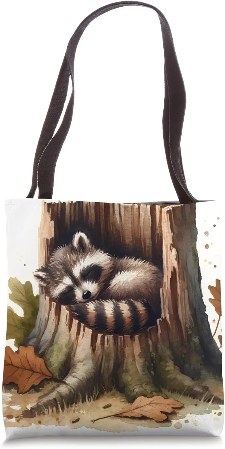 Sleeping Raccoon In An Old Tree Stump, Fallen Leaves. Sleep Tote Bag